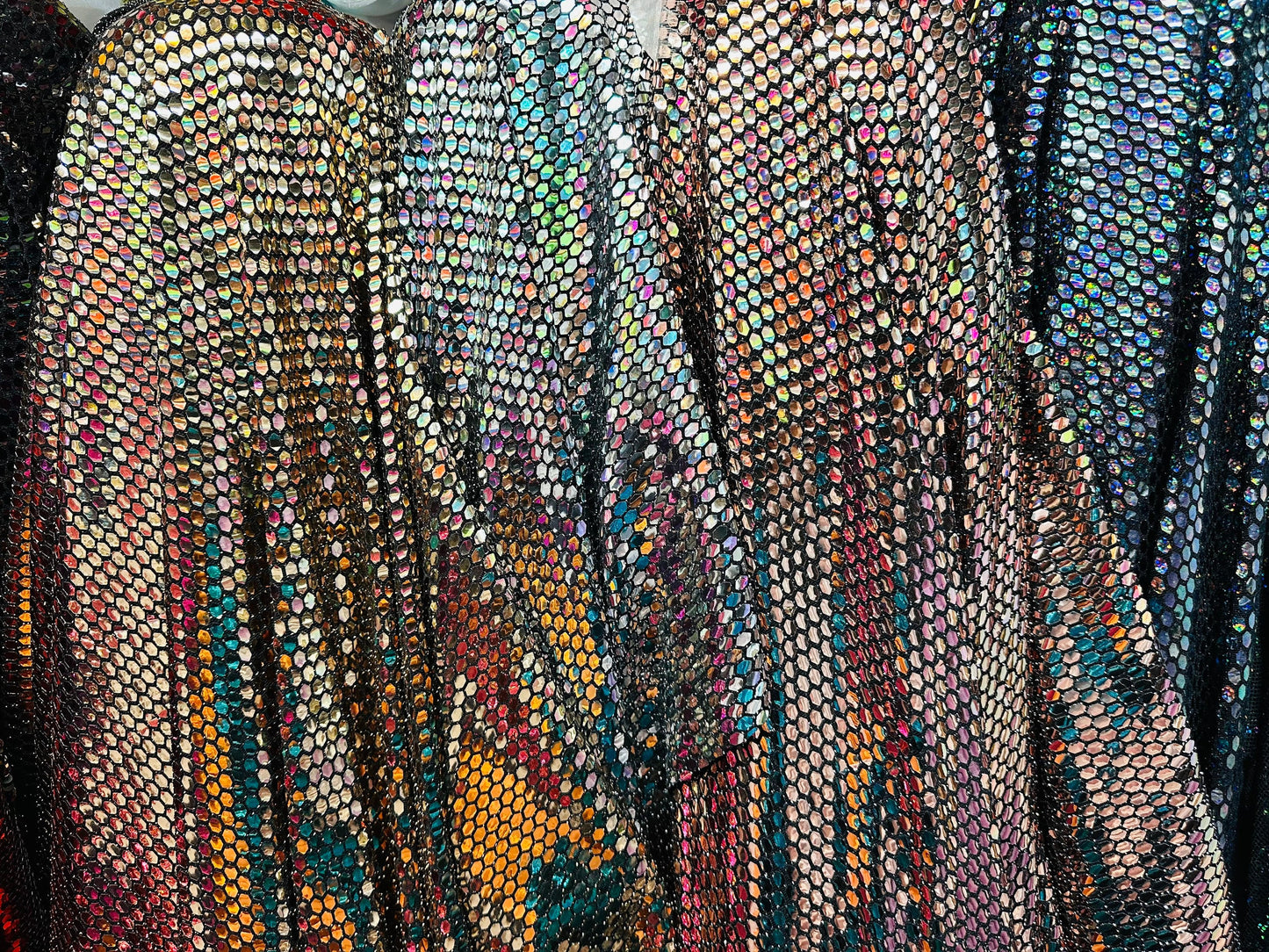 Honeycomb geometric design metallic spandex with shiny sequins 2-way stretch 58/60” Sold by the YD. Ships worldwide from L.A