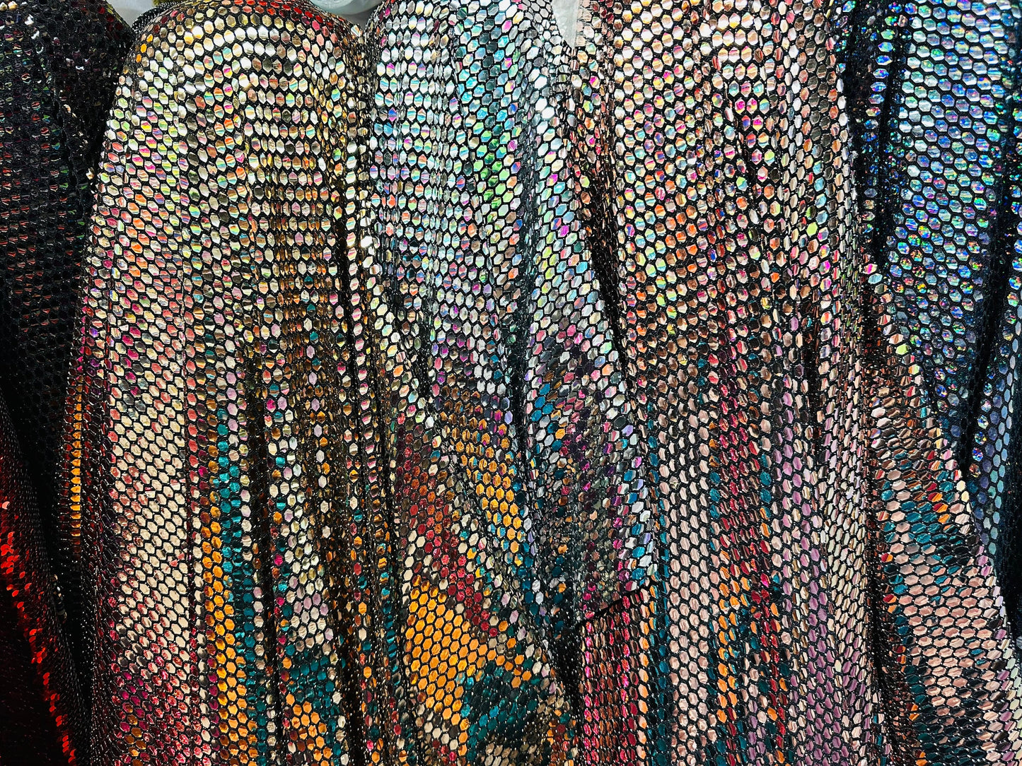 Honeycomb geometric design metallic spandex with shiny sequins 2-way stretch 58/60” Sold by the YD. Ships worldwide from L.A