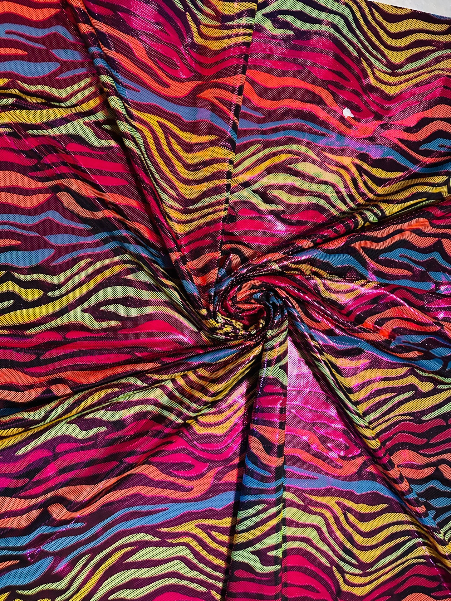 Exotic zebra design hologram metallic nylon spandex 4-way stretch 58/60” Sold by the YD. Ships worldwide from Los Angeles California USA