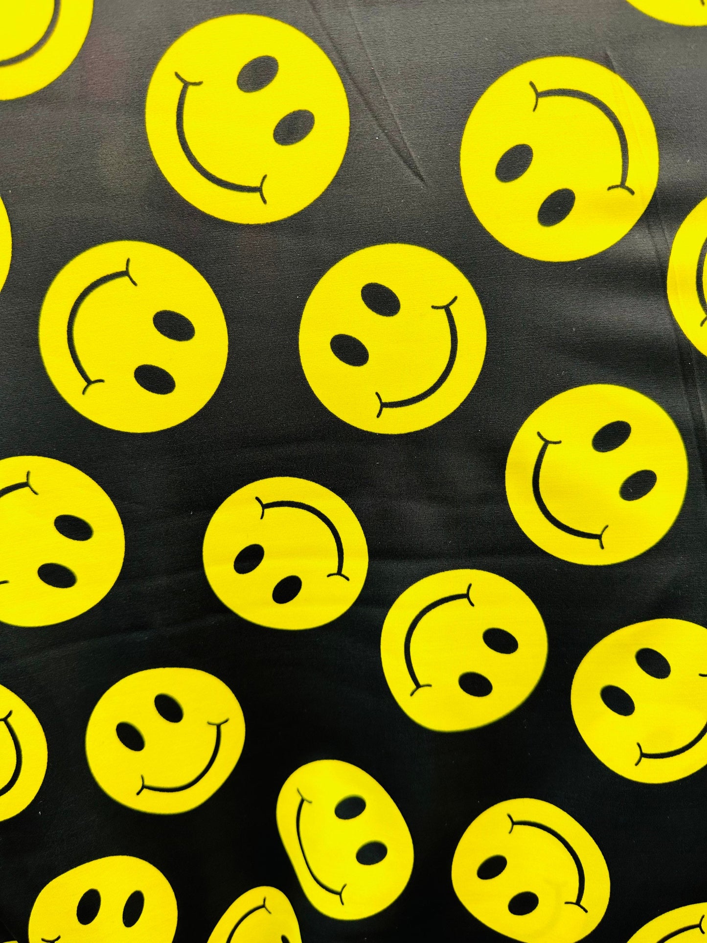 Happy Face Emoji design print on best quality of nylon spandex 4-way stretch 58/60” Sold by the YD. Ships worldwide from L.A