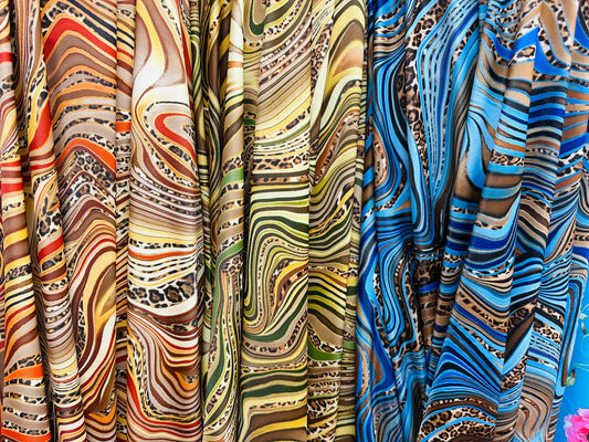 Safari design exotic animal print on best quality of nylon spandex 4-way stretch 58/60” Sold by the YD. Ships worldwide from Los Angeles CA