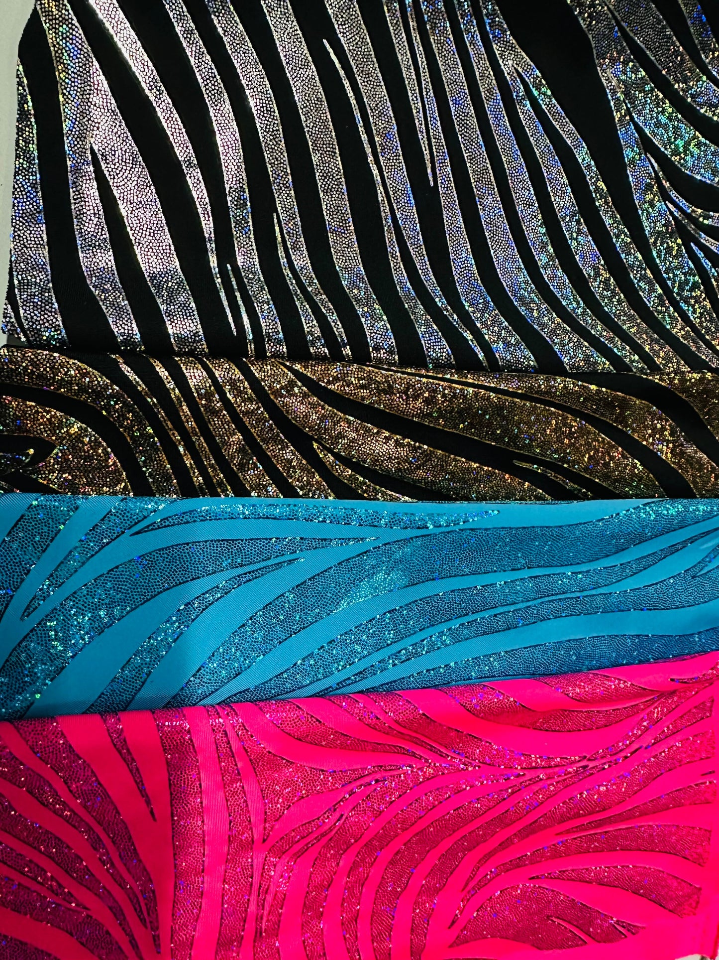 New zebra design hologram 2times foil nylon spandex 4way Stretch 58/60" Sold by the YD. Ships Worldwide from Los Angeles California USA.