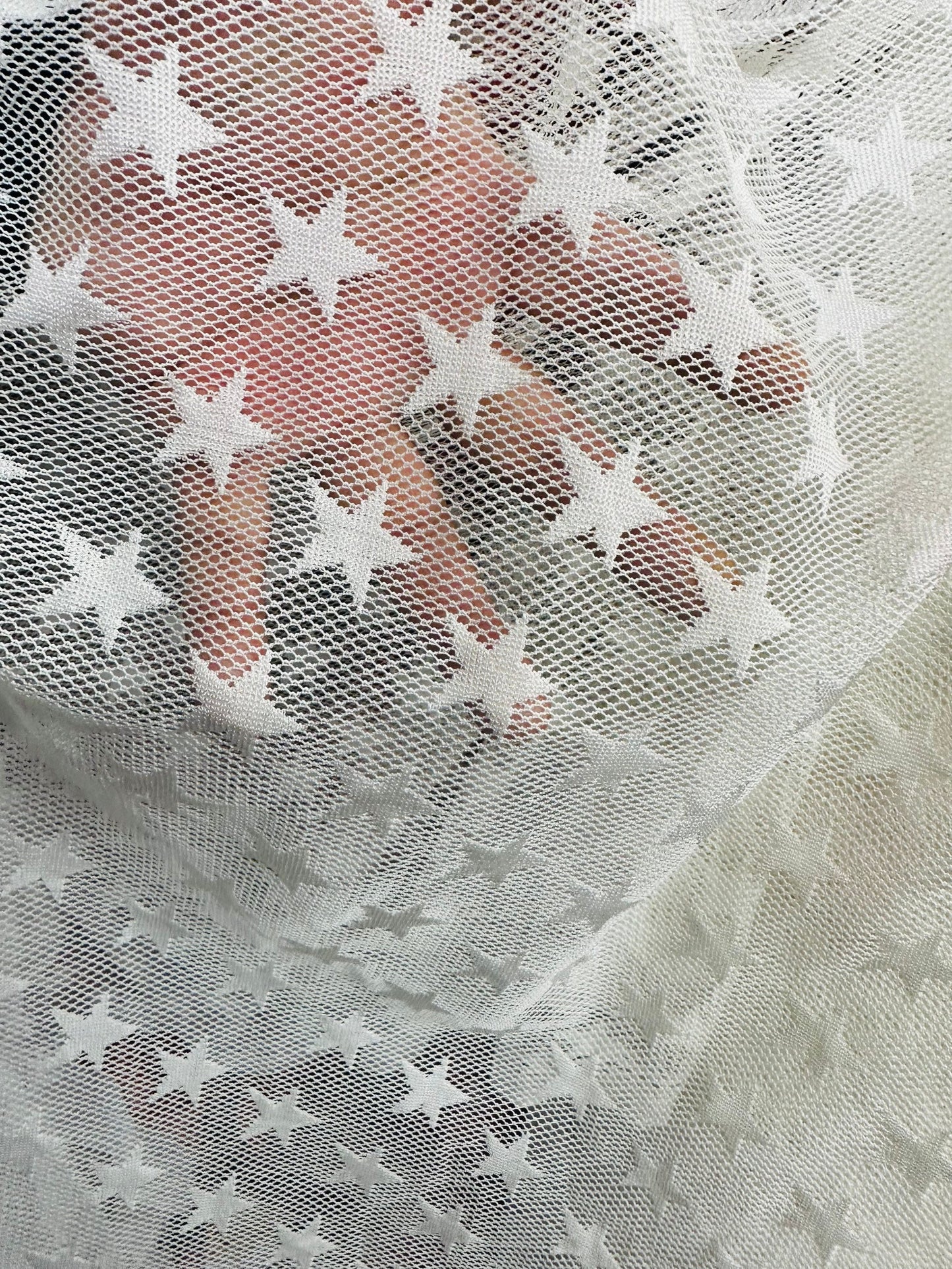 New Freedom Stars design embroidered on poly spandex mesh 2-way stretch 58/60” Sold by the YD. Ships worldwide from Los Angeles