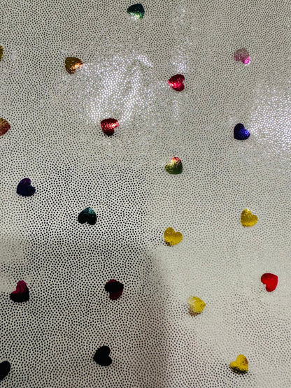 Hearts design metallic hologram nylon spandex W/Silver multicolor 4-way stretch spandex 58/60” Sold by the YD. Ships worldwide from L.A