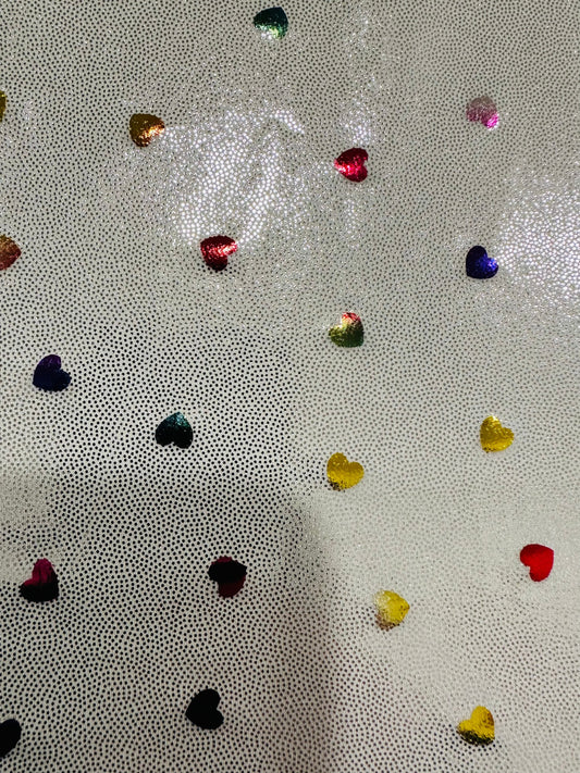 Hearts design metallic hologram nylon spandex W/Silver multicolor 4-way stretch spandex 58/60” Sold by the YD. Ships worldwide from L.A
