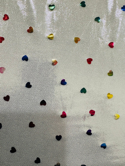 Hearts design metallic hologram nylon spandex W/Silver multicolor 4-way stretch spandex 58/60” Sold by the YD. Ships worldwide from L.A