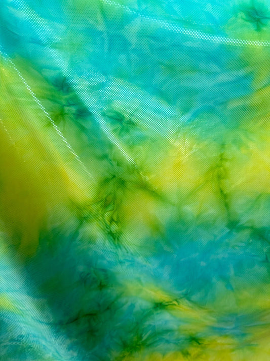 Tie dye design aqua/yellow metallic nylon spandex 4-way stretch 58/60” Sold by the YD. Ships worldwide from Los Angeles California USA