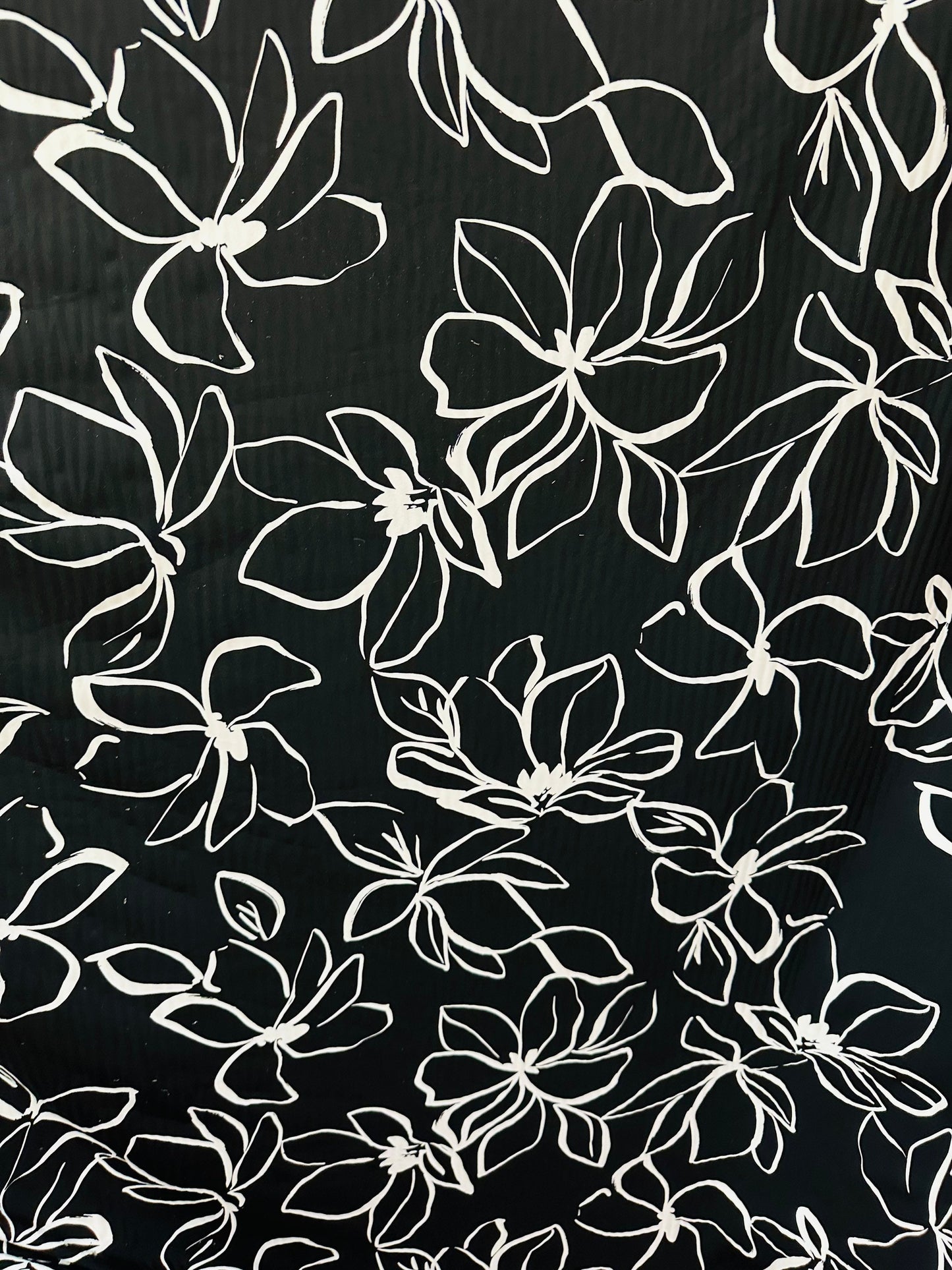 Orchid design Black/White print on great quality of nylon spandex 4-way stretch 58/60” Sold by the YD. Ships worldwide from L.A