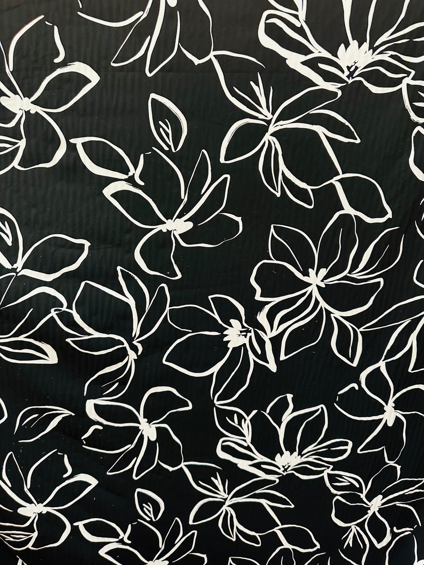 Orchid design Black/White print on great quality of nylon spandex 4-way stretch 58/60” Sold by the YD. Ships worldwide from L.A