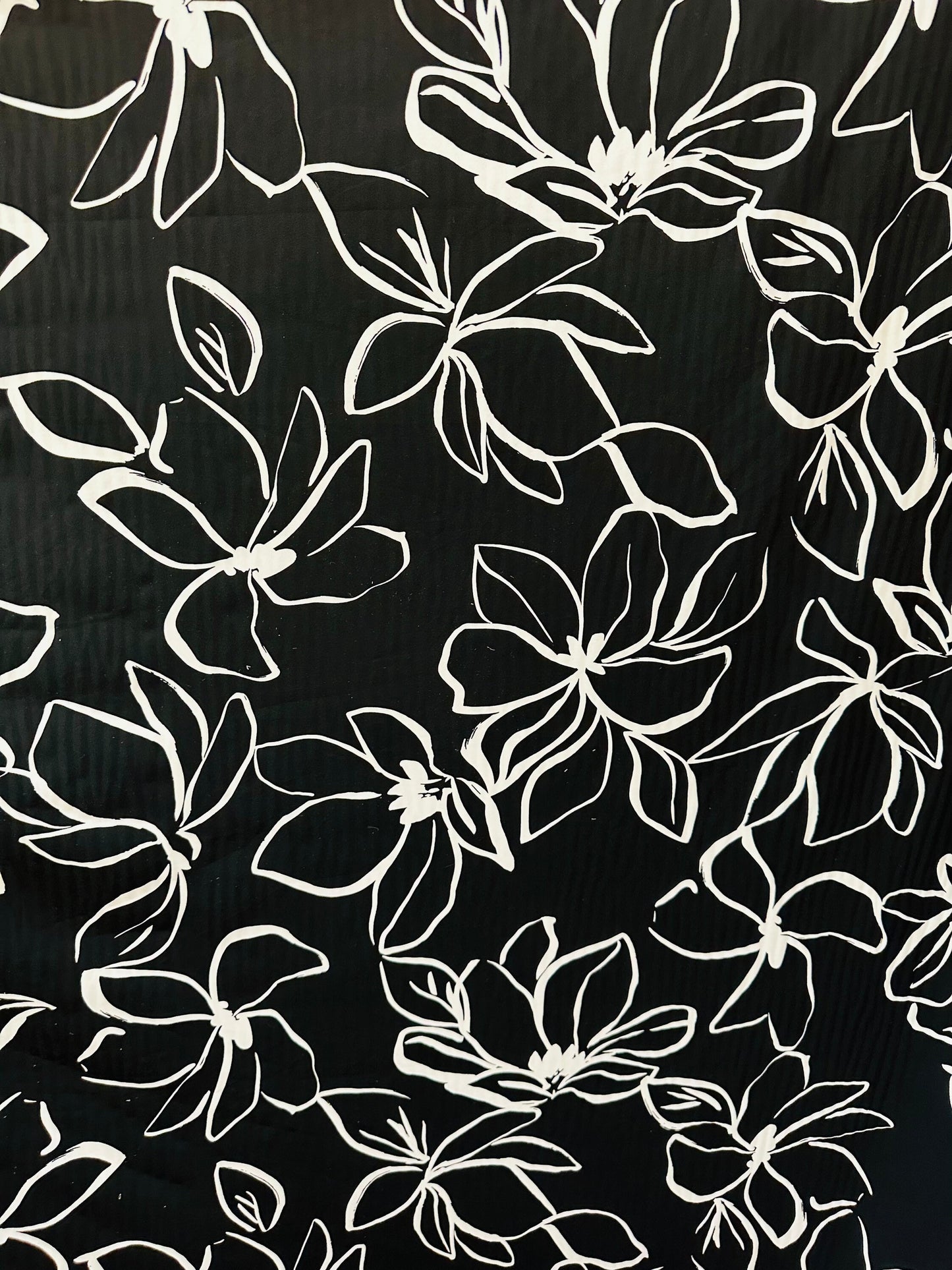 Orchid design Black/White print on great quality of nylon spandex 4-way stretch 58/60” Sold by the YD. Ships worldwide from L.A