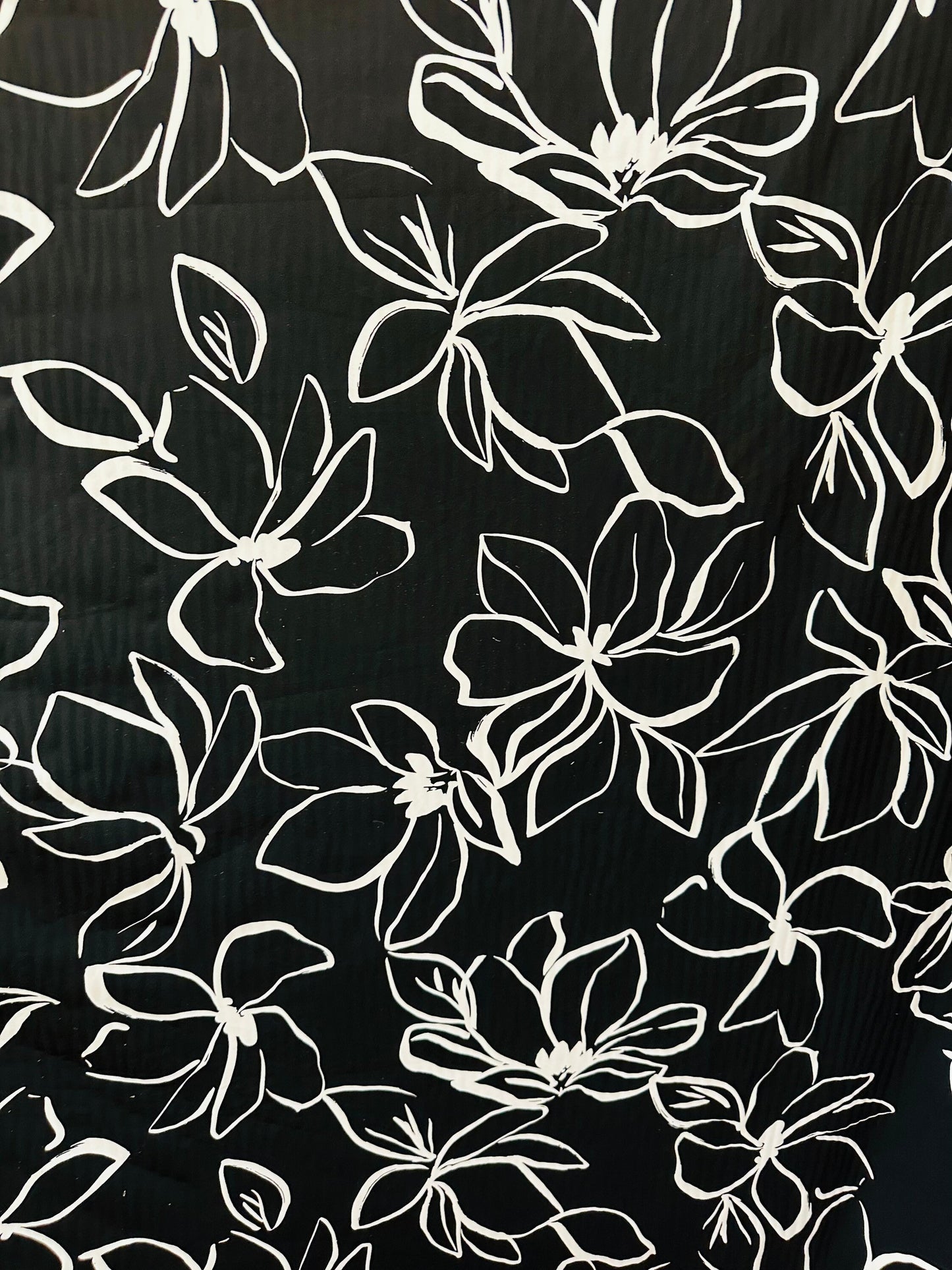 Orchid design Black/White print on great quality of nylon spandex 4-way stretch 58/60” Sold by the YD. Ships worldwide from L.A