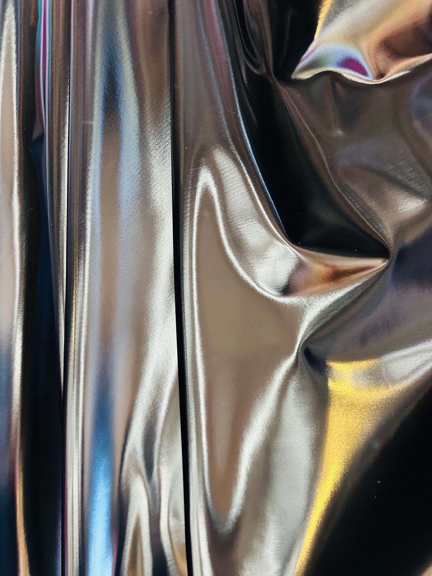 Luxury super shiny reflective black stretch vinyl high quality of latex 4-way stretch 58/60” Sold by the YD. Ships worldwide from L.A CA