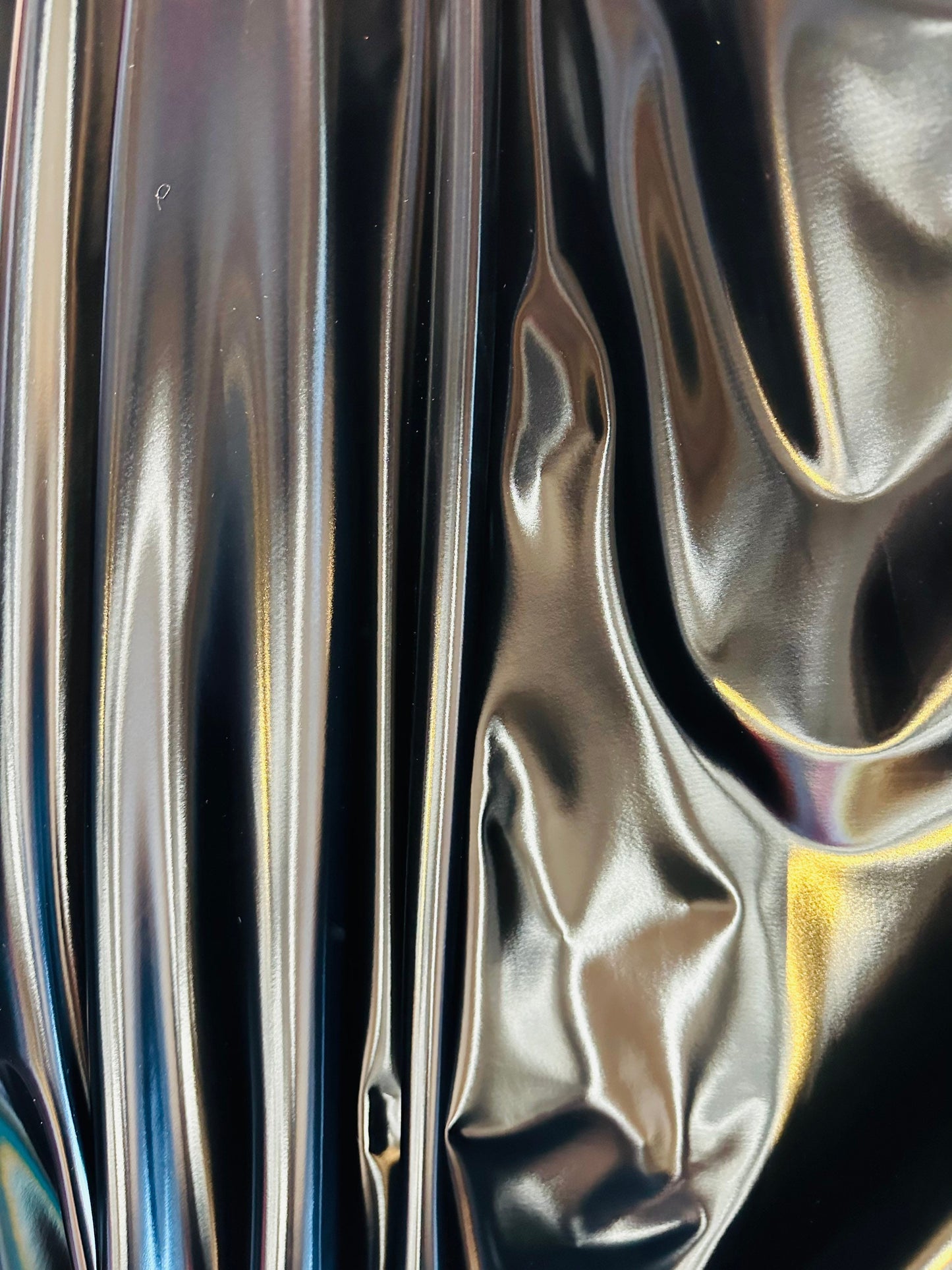 Luxury super shiny reflective black stretch vinyl high quality of latex 4-way stretch 58/60” Sold by the YD. Ships worldwide from L.A CA