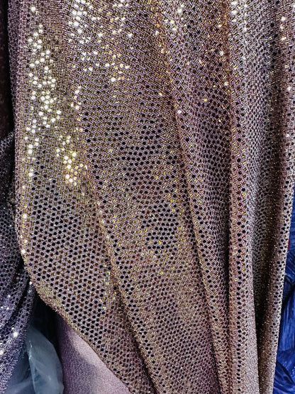 Mini disco shiny sequins on metallic poly spandex 2-way stretch 58/50” Sold by the YD. Ships worldwide from Los Angeles California USA