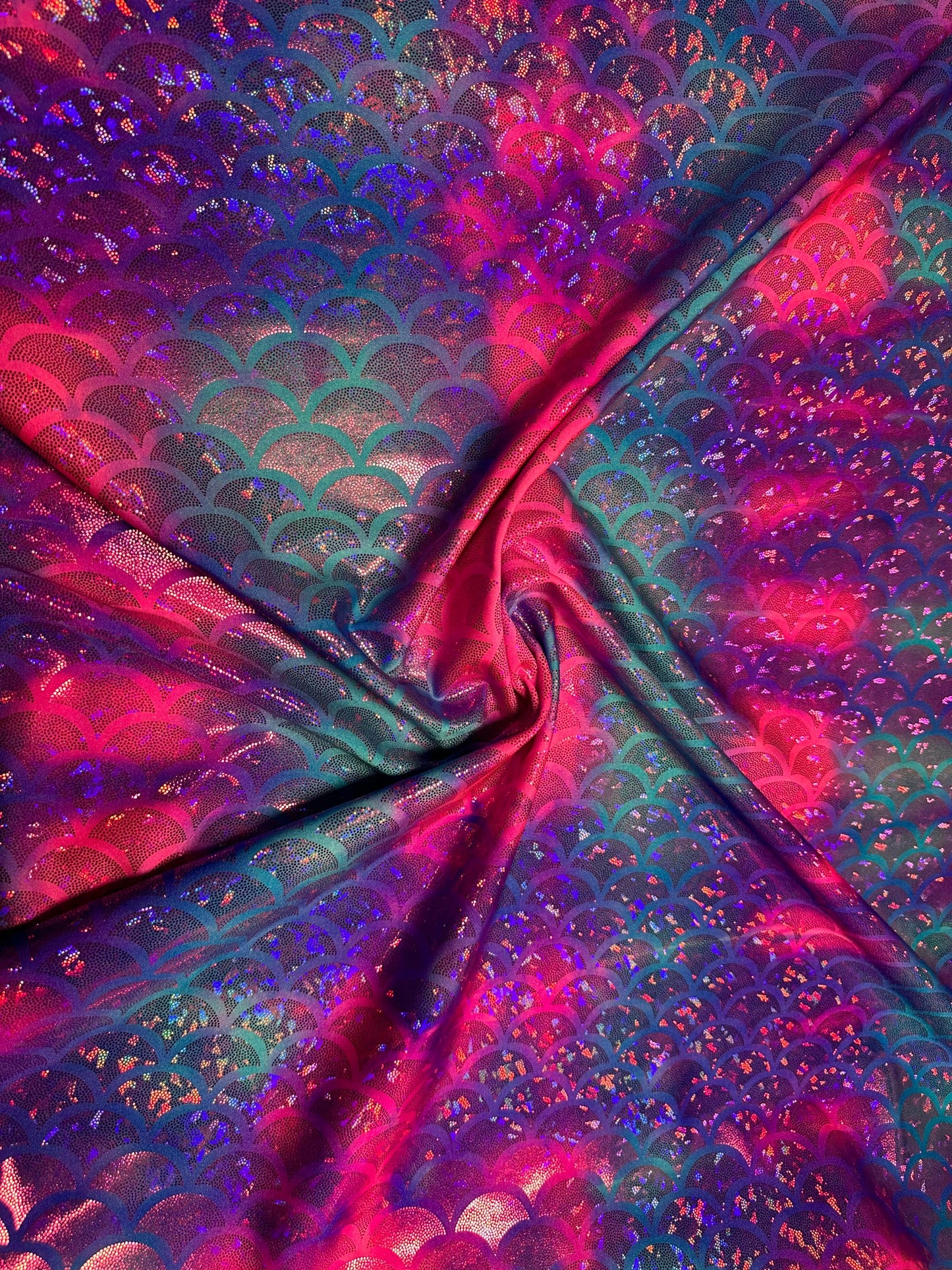 Sirena design cotton candy color hologram metallic nylon spandex 4-way stretch 58/60” Sold by the YD. Ships worldwide from Los Angeles Calif