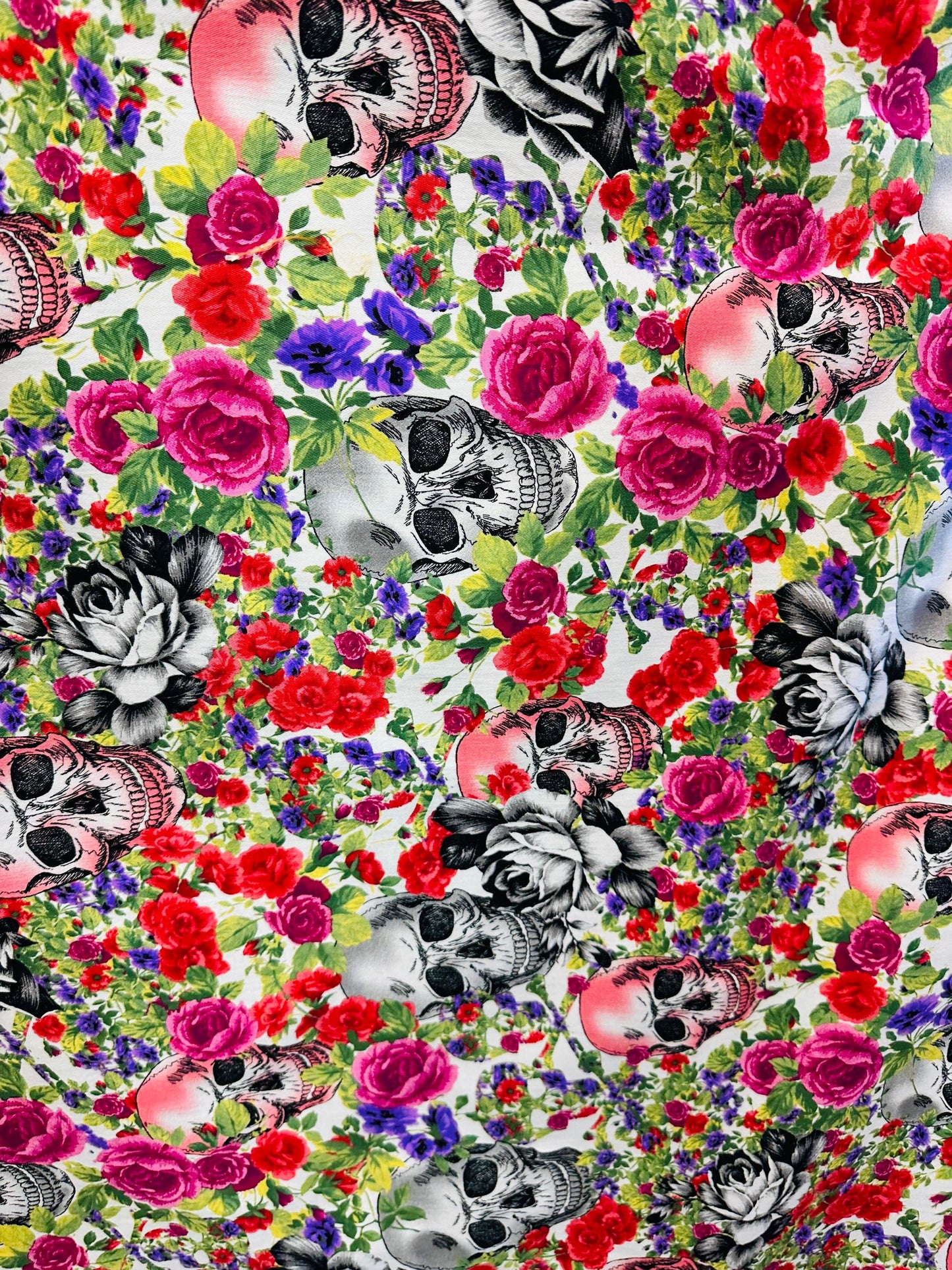 Skull and flowers design print on great quality of stretch twill 2-way stretch 50/52” Sold by the YD. Ships worldwide from L.A