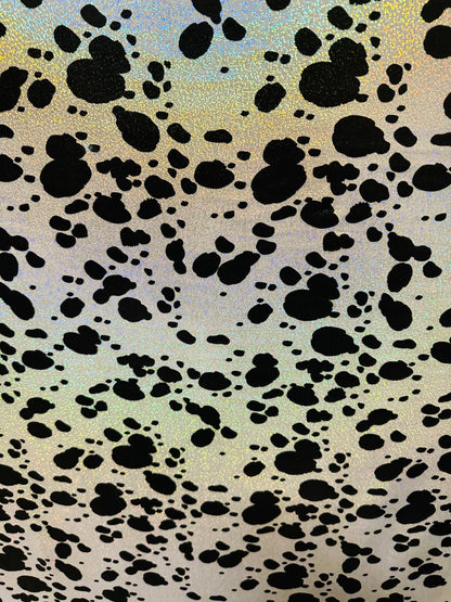 Dalmatian design on hologram foggy foil metallic nylon spandex 4-way stretch 58/60” Sold by the YD. Ships worldwide from L.A