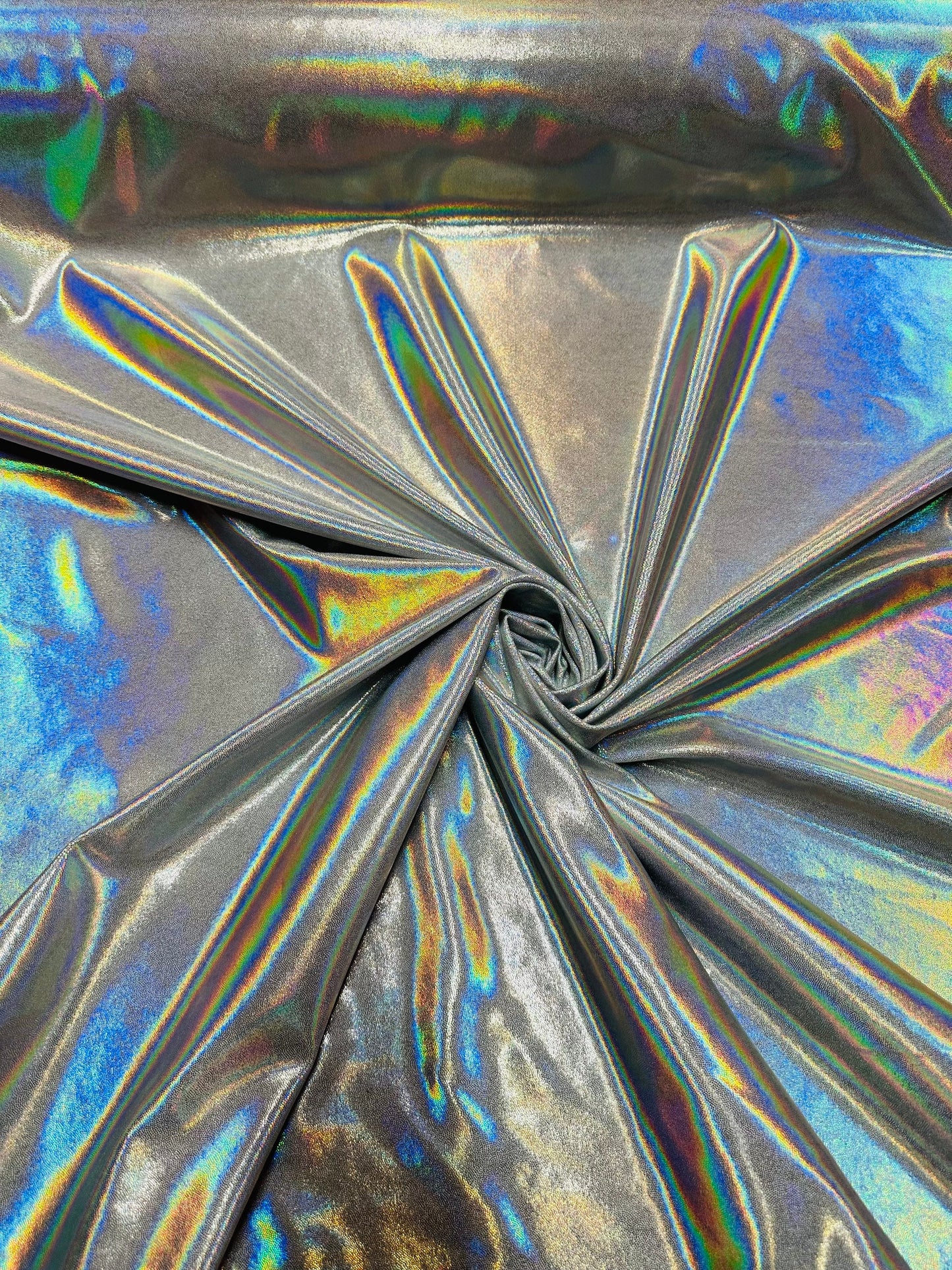 Oil slick design iridescent white silver foggy foil hologram metallic nylon spandex 4-way stretch 58/60” Sold by the YD.