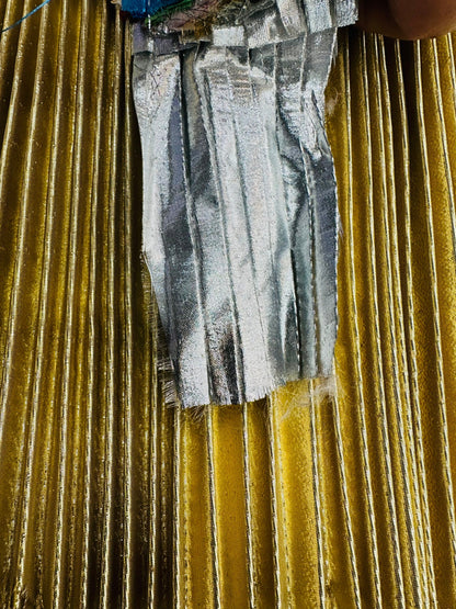 Luxury Acordeón metallic pleated super shiny fabric 45” Sold by the YD. Ships worldwide from Los Angeles California USA