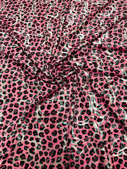 Cheetah design metallic nylon spandex 4-way stretch 58/60” Sold by the YD. Ships worldwide from Los Angeles California USA