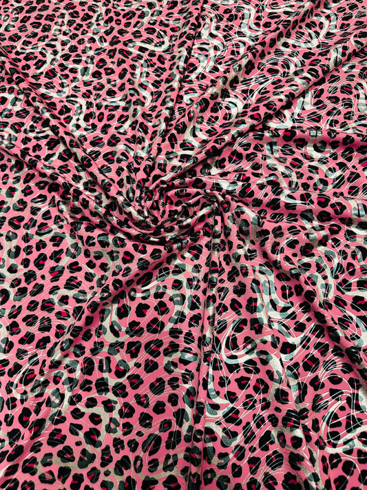 Cheetah design metallic nylon spandex 4-way stretch 58/60” Sold by the YD. Ships worldwide from Los Angeles California USA