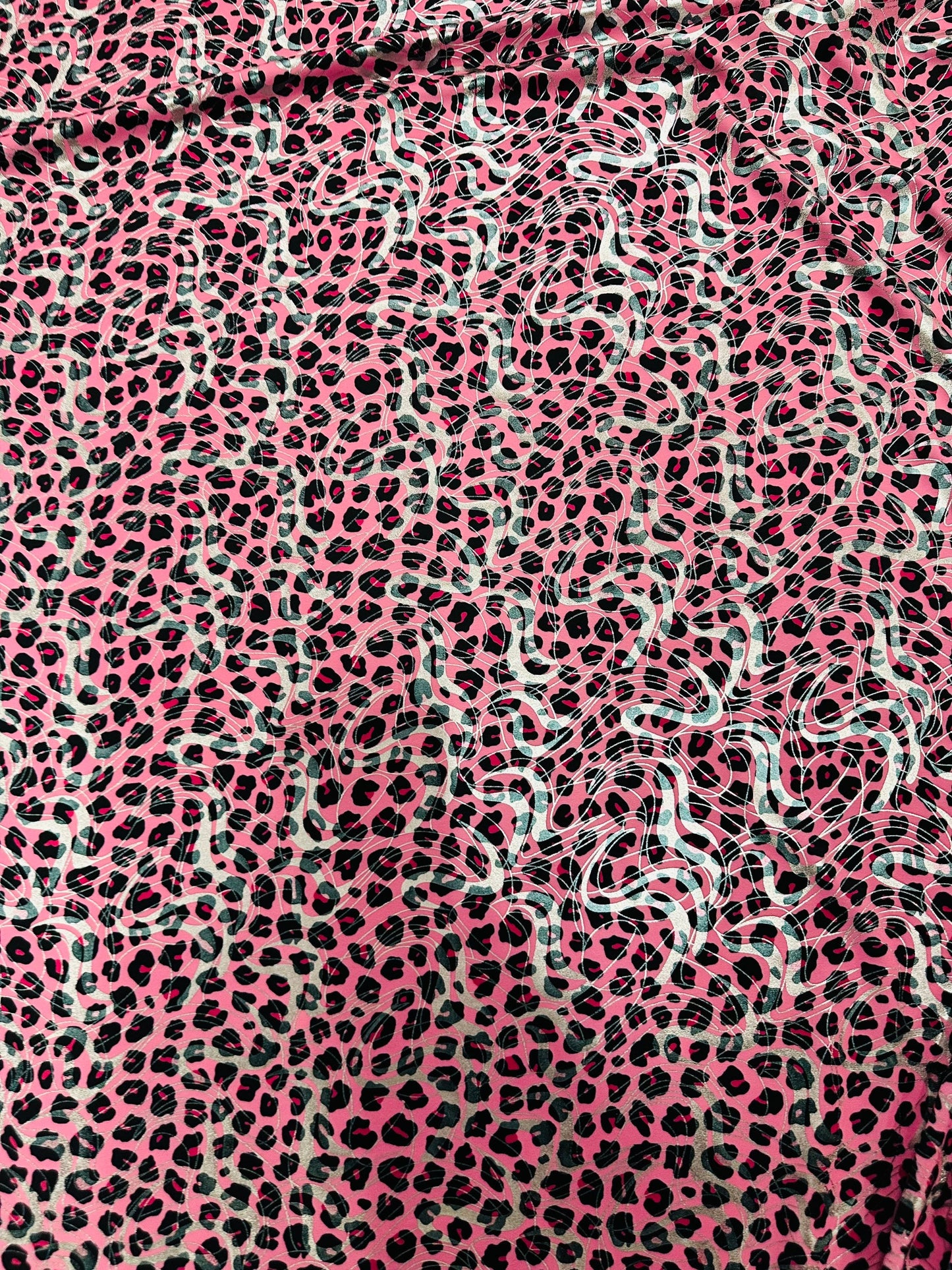 Cheetah design metallic nylon spandex 4-way stretch 58/60” Sold by the YD. Ships worldwide from Los Angeles California USA