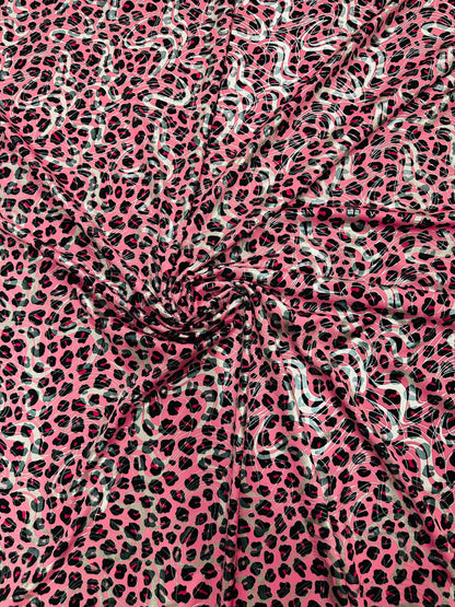 Cheetah design metallic nylon spandex 4-way stretch 58/60” Sold by the YD. Ships worldwide from Los Angeles California USA