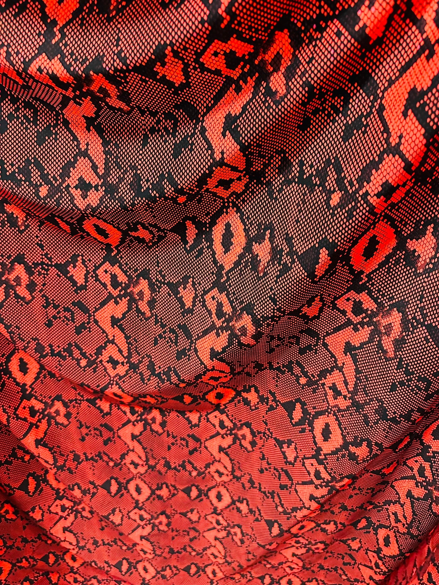 Red snake design print on great quality of nylon spandex;-way stretch 58/60” Sold by the YD Sold by the YD. Ships worldwide from Los Angeles