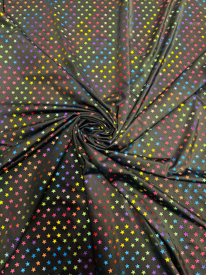 Stars multicolor design black/rainbow print on best quality of nylon spandex 4-way stretch 58/60” Sold by the YD.