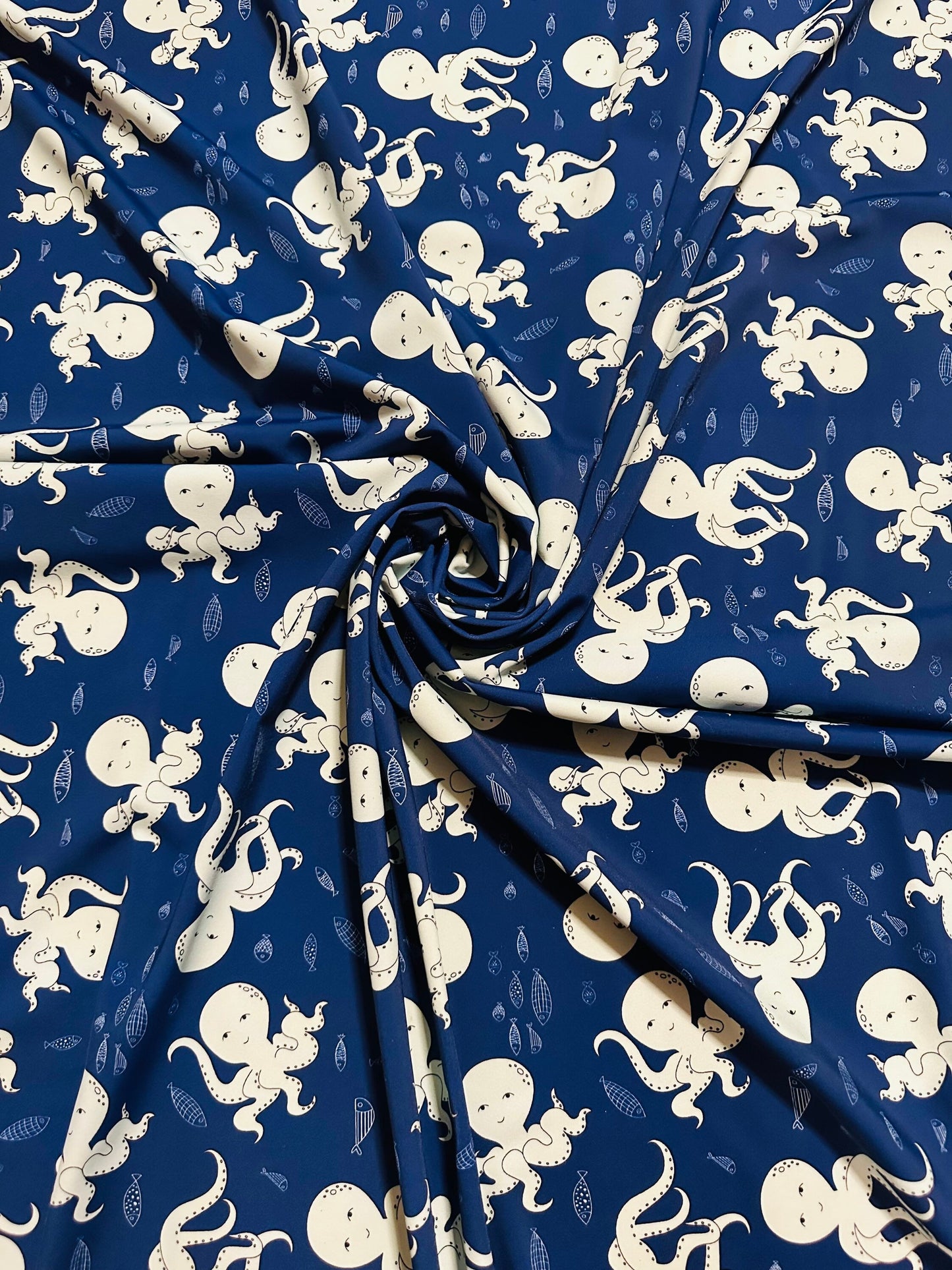 New Baby octopus design print on best quality of nylon spandex 4-way stretch 58/60” Sold by the YD.