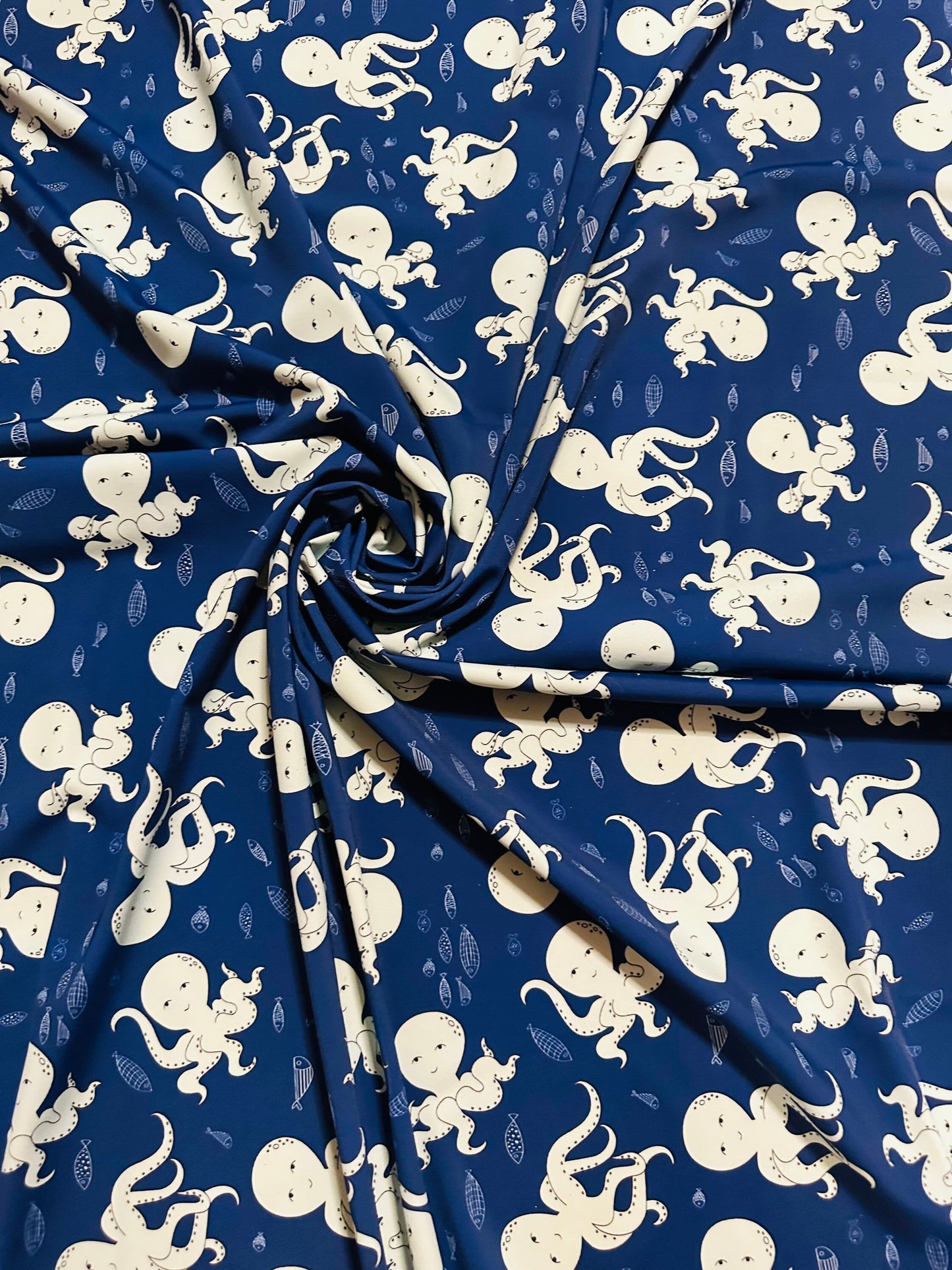 New Baby octopus design print on best quality of nylon spandex 4-way stretch 58/60” Sold by the YD.