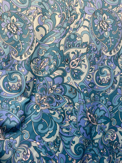 Floral design teal blue print on great quality of nylon spandex 4-way stretch 58/60” Sold by the YD. Ships worldwide from L.A