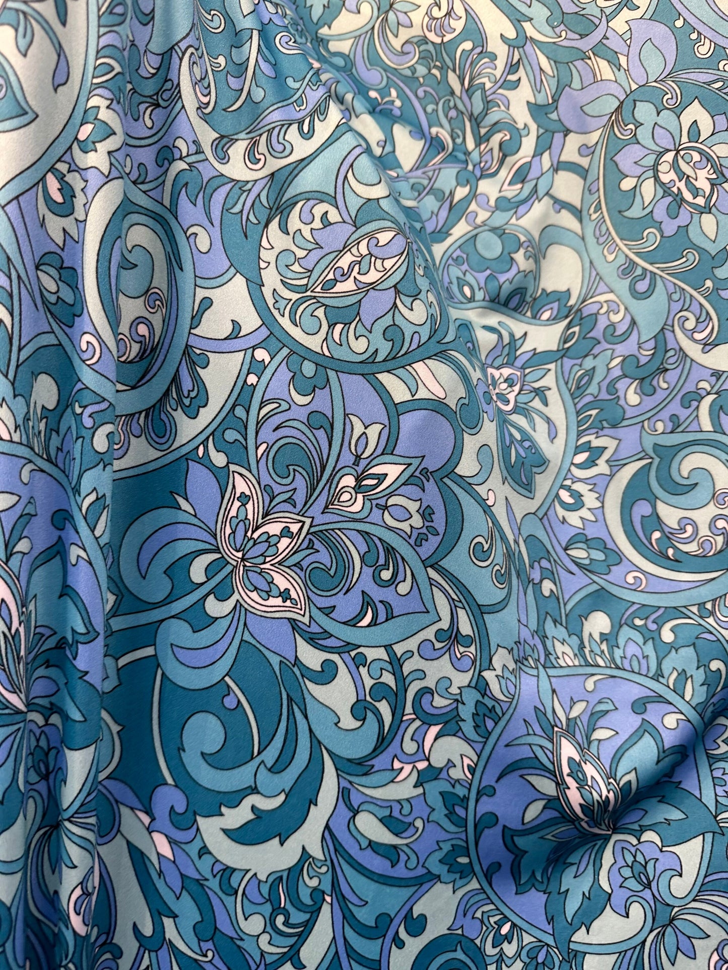 Floral design teal blue print on great quality of nylon spandex 4-way stretch 58/60” Sold by the YD. Ships worldwide from L.A