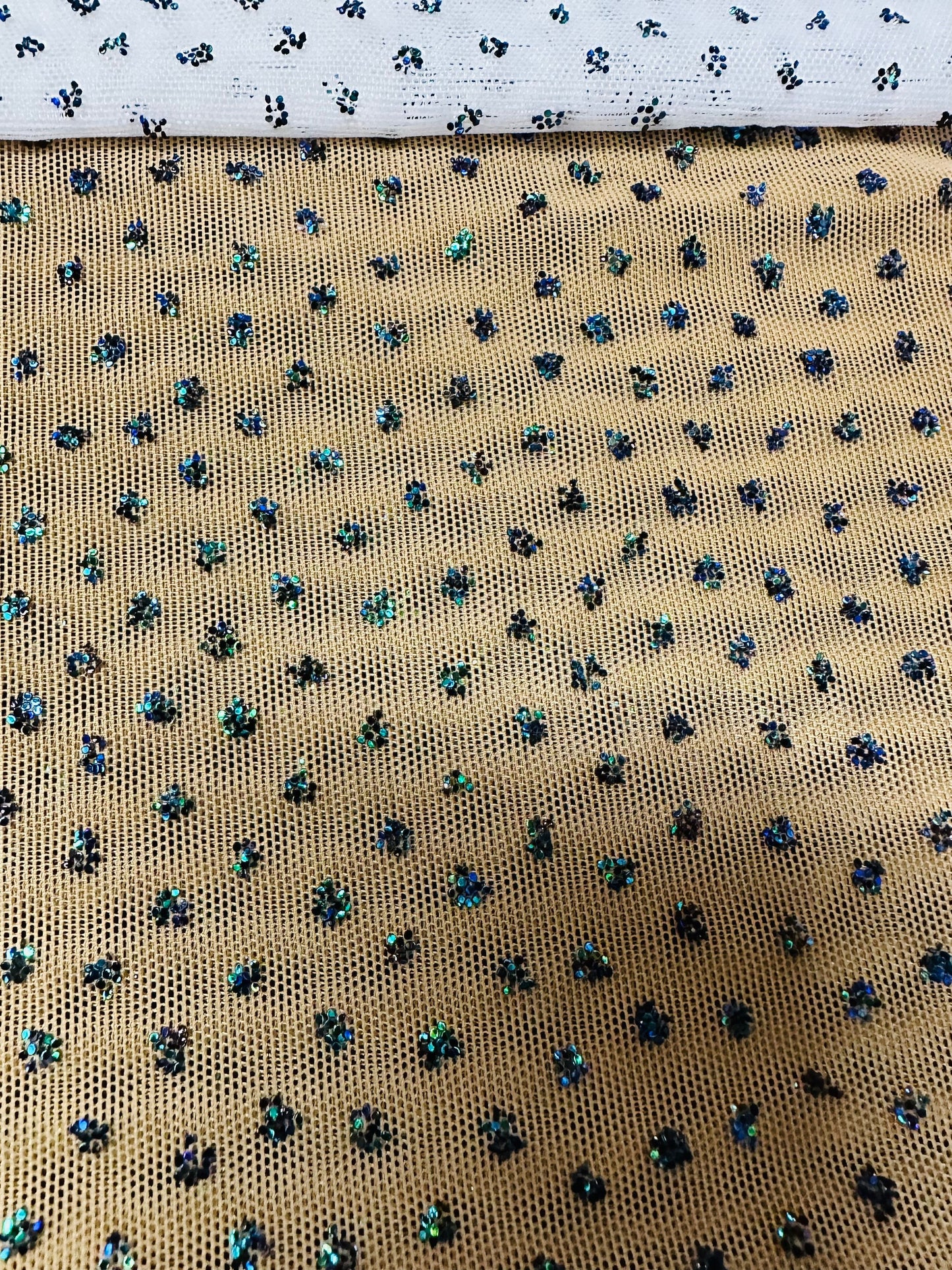 New Caviar beaded glitter design on power mesh best quality nylon spandex 4-way stretch 58/60” Sold by the YD. Ships worldwide from L.A