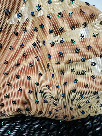 New Caviar beaded glitter design on power mesh best quality nylon spandex 4-way stretch 58/60” Sold by the YD. Ships worldwide from L.A