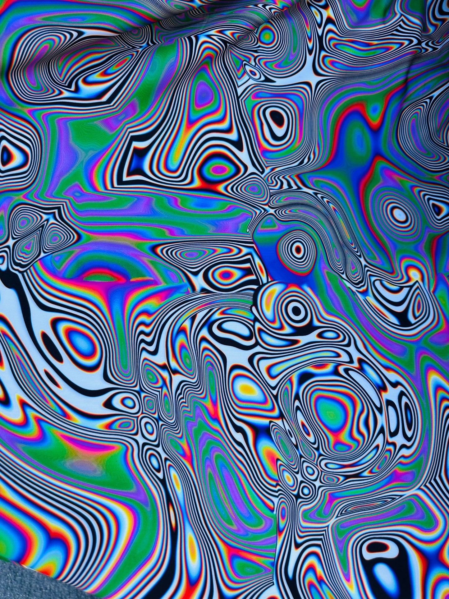Abstract design multicolor print on great quality nylon spandex under UV light 4-way stretch 58/60” Sold by the YD. Ships worldwide from L.A