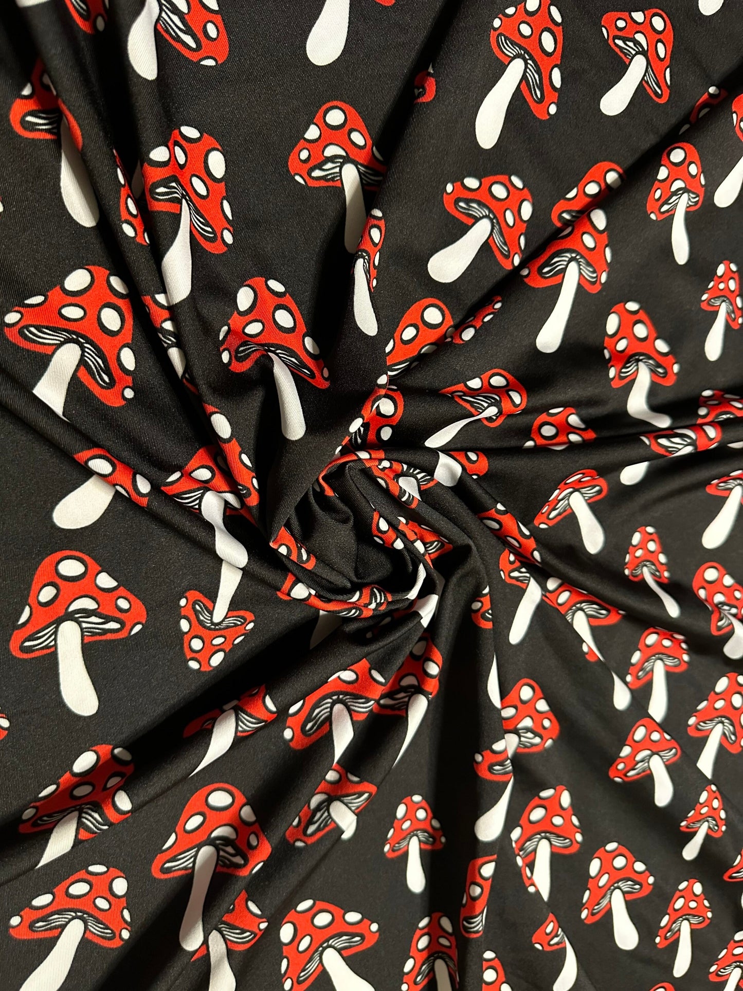 New Mushrooms designs Black/Red print on nylon spandex 4-way stretch 58/60” Sold by the YD. Ships worldwide from Los Angeles California USA