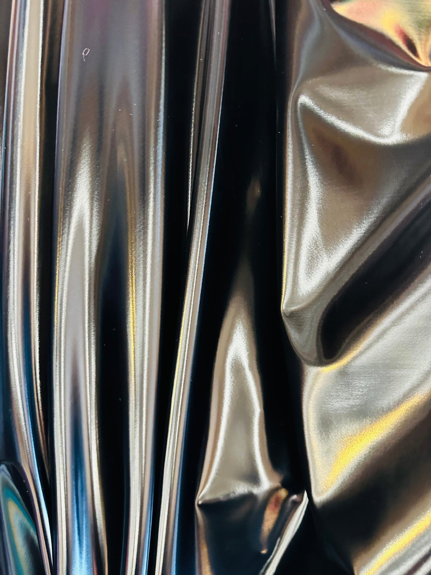Luxury super shiny reflective black stretch vinyl high quality of latex 4-way stretch 58/60” Sold by the YD. Ships worldwide from L.A CA