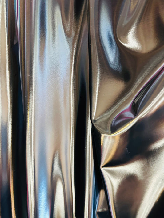 Luxury super shiny reflective black stretch vinyl high quality of latex 4-way stretch 58/60” Sold by the YD. Ships worldwide from L.A CA