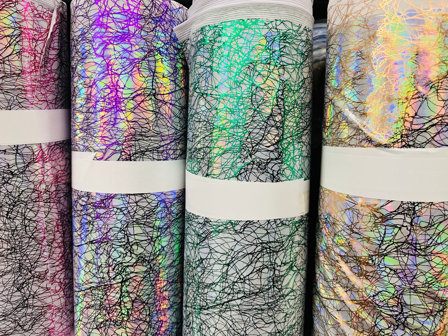 New Modern Pollock abstract design hologram metallic nylon spandex 4-way stretch 58/60” Sold by the YD.