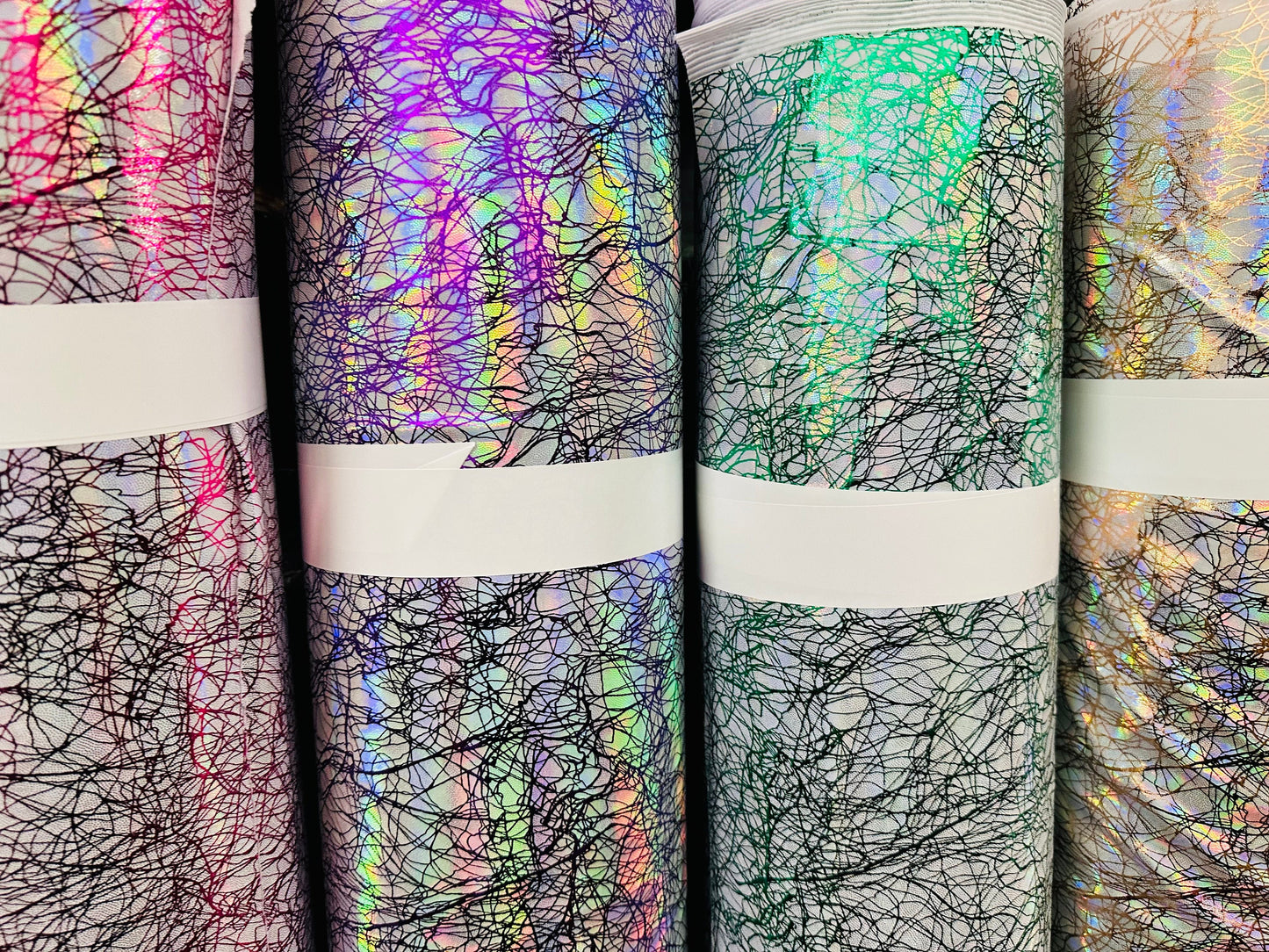 New Modern Pollock abstract design hologram metallic nylon spandex 4-way stretch 58/60” Sold by the YD.