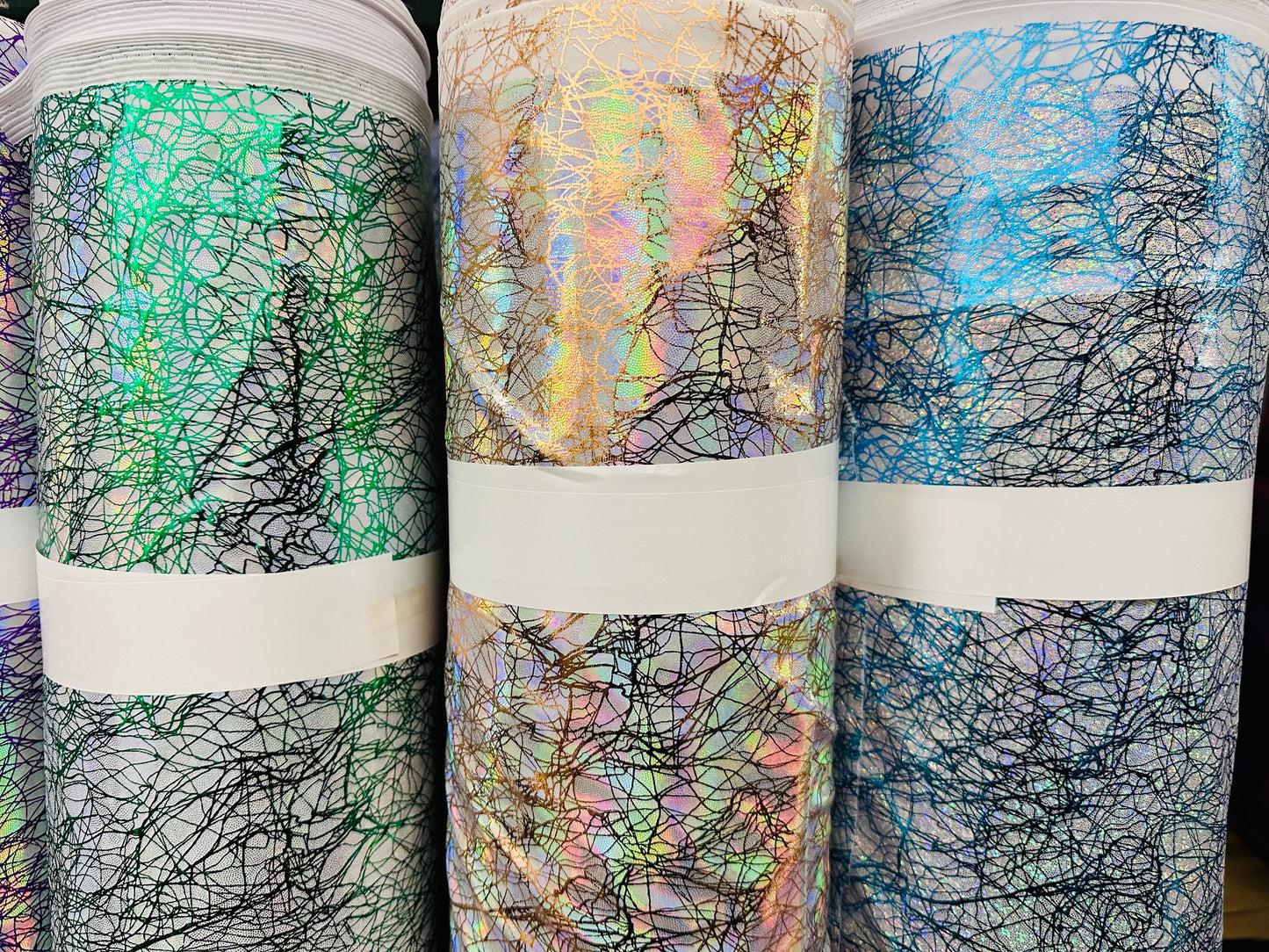 New Modern Pollock abstract design hologram metallic nylon spandex 4-way stretch 58/60” Sold by the YD.