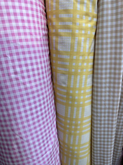 Gingham design print on great quality of nylon spandex 4-way stretch 58/60” Sold by the YD.