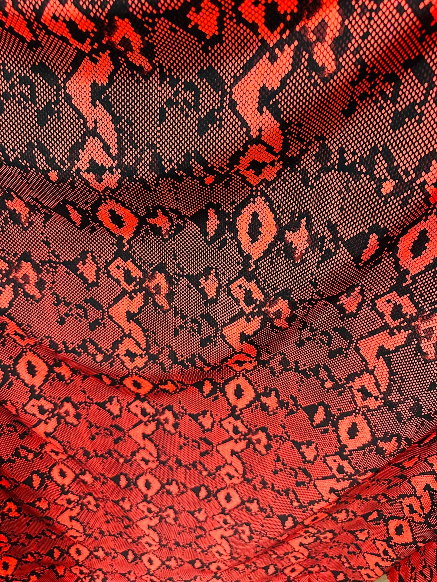 Red snake design print on great quality of nylon spandex;-way stretch 58/60” Sold by the YD Sold by the YD. Ships worldwide from Los Angeles