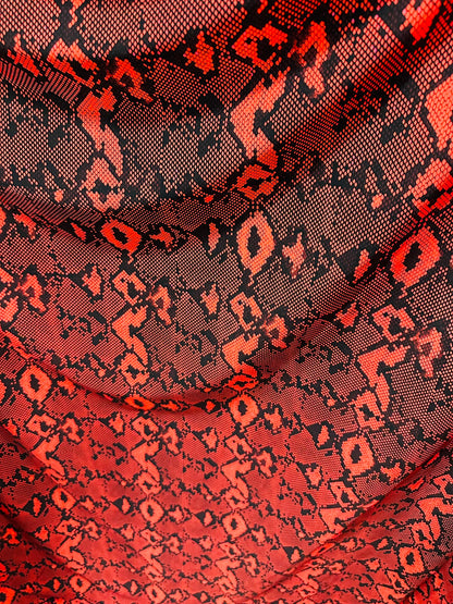 Red snake design print on great quality of nylon spandex;-way stretch 58/60” Sold by the YD Sold by the YD. Ships worldwide from Los Angeles