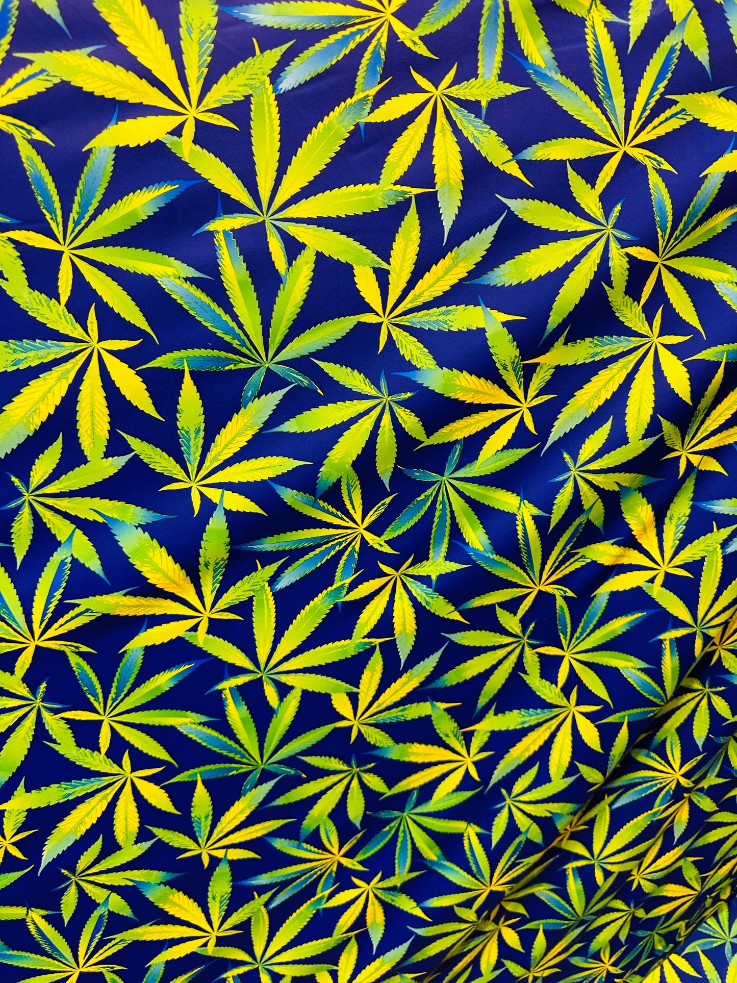 Marihuana leaf design multicolor print on best quality of nylon spandex 4-way stretch 58/60” Sold by the YD. Ships worldwide from L.A