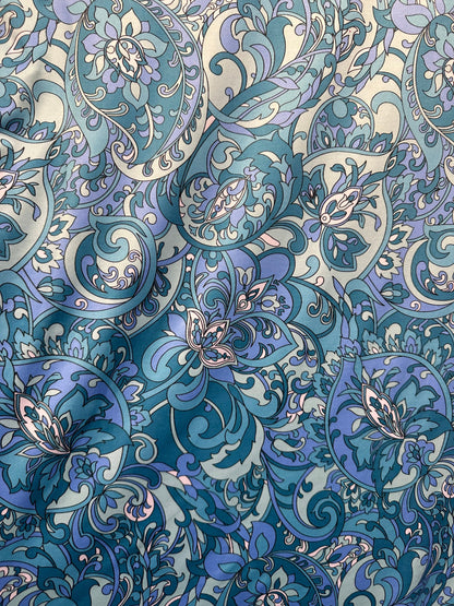 Floral design teal blue print on great quality of nylon spandex 4-way stretch 58/60” Sold by the YD. Ships worldwide from L.A