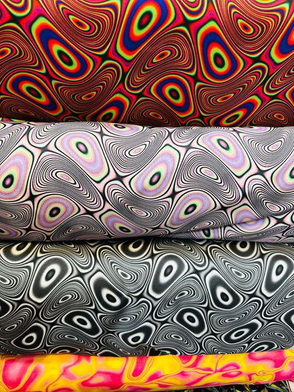 Modern Psychedelic lava design print on great quality of nylon spandex;-way stretch 58/60” Sold by the YD. Ships worldwide from L.A