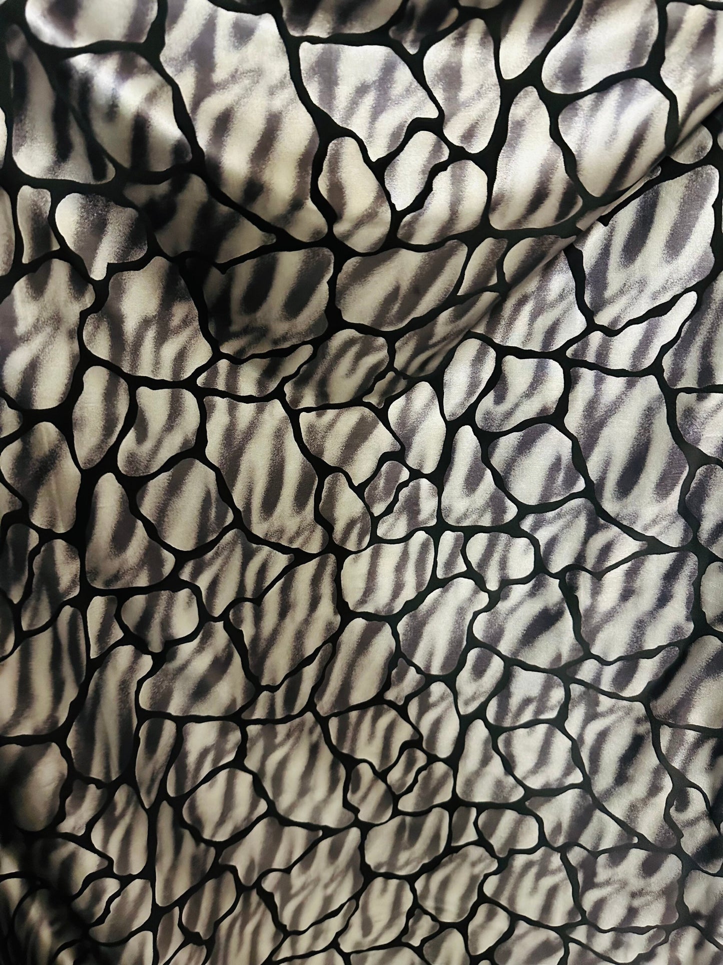 Giraffe abstract design metallic nylon spandex;-way stretch 58/60” Sold by the YD. Ships worldwide from Los Angeles California USA