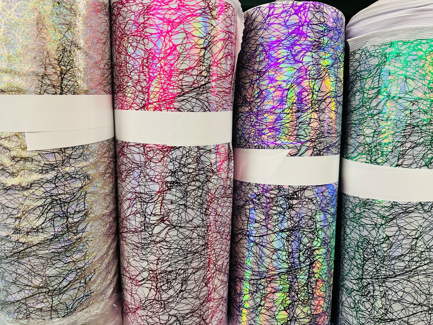 New Modern Pollock abstract design hologram metallic nylon spandex 4-way stretch 58/60” Sold by the YD.